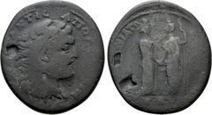 Roman Provincial Coins PISIDIA. Apollonia Mordiaion. Pseudo-autonomous. Ae (3rd century AD). Homonoia with Ilium Obv: AΛЄΞA KTIC AΠΟΛΛΩNIATΩN. Head of Alexander the Great right, wearing lion skin. Rev