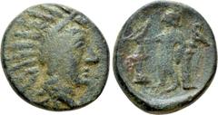 Greek Coins LYCIA. Arykanda. Ae (2nd century BC). Obv: Radiate head of Sozon(?) right. Rev: Apollo standing left, holding bow and resting elbow on column to right; quiver to left, monogram to right. S