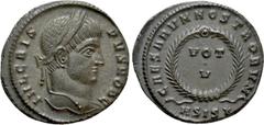 Roman Imperial Coins CRISPUS (Caesar, 316-326). Follis. Siscia. Obv: IVL CRISPVS NOB C. Laureate head right. Rev: CAESARVM NOSTRORVM / ASIS (star). VOT / V in two lines within wreath. RIC 161. Conditi