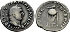 Roman Imperial Coins VITELLIUS (69). Denarius. Rome. Obv: A VITELLIVS GERM IMP AVG TR P. Laureate head right. Rev: XV VIR SACR FAC. Tripod surmounted by dolphin right; below, raven right. RIC² 109. Ex