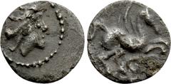 Greek Coins SPAIN. Emporion. Tetartemorion (Late 3rd-1st centuries BC). Gaulish-Iberian imitation. Obv: Male head right. Rev: Pegasos flying right; two circles below. ACIP 526. Rare Condition: Very fi