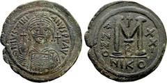 Byzantine Coins JUSTINIAN I (527-565). Follis. Nicomedia. Dated RY 21 (547/8). Obv: D N IVSTINIANVS P P AVG. Helmeted and cuirassed bust facing, holding globus cruciger and shield decorated with horse