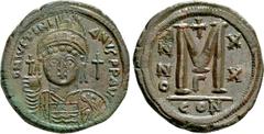 Byzantine Coins JUSTINIAN I (527-565). Follis. Constantinople. Dated RY 20 (546/7). Obv: D N IVSTINIANVS P P AVG. Helmeted and cuirassed bust facing, holding globus cruciger and shield decorated with 