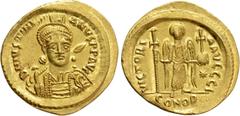 Byzantine Coins JUSTINIAN I (527-565). GOLD Solidus. Constantinople. Obv: D N IVSTINIANVS P P AVG. Helmeted and cuirassed bust facing slightly right, holding spear and shield decorated with horseman m