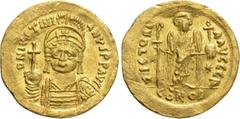 Byzantine Coins JUSTINIAN I (527-565). GOLD Solidus. Constantinople. Obv: D N IVSTINIANVS P P AVG. Helmeted and cuirassed bust facing, holding globus cruciger and shield decorated with horseman motif.