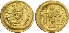 Byzantine Coins JUSTINIAN I (527-565). GOLD Solidus. Constantinople. Obv: D N IVSTINIANVS P P AVG. Helmeted and cuirassed bust facing, holding globus cruciger and shield decorated with horseman motif.