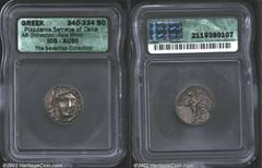 Satraps of Caria. Pixodaros, 340-334 B.C. AR didrachm. Laureate head of Apollo facing, with chlamys fastened at neck/Zeus Labraundos standing, holding double ax (labrys) and lotus-tipped scepter. 6.80