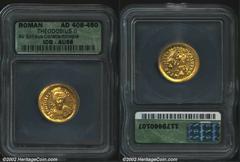 Theodosius II, A.D. 402-450. AV solidus minted at Constantinople, A.D. 425 (January-October). Helmeted and cuirassed bust facing, holding spear and shield/Theodosius II enthroned; to right, Valentinia