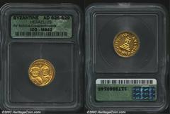 Heraclius, A.D. 610-641. AV solidus minted at Constantinople, A.D. 626-629. Facing busts of Heraclius and Heraclius Constantine/Cross potent on three steps; "K" follows officina letter. 4.44 g. D.O. 2