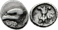ELIS. Olympia. Ca. 408 BC. AR stater (25mm, 12.11 gm, 11h). Zeus mint, struck for the 93rd Olympiad. Head of eagle with piercing eye left; under its beak large ivy leaf, die-engraver's signature ΔA on