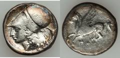 Corinth. Early to late 4th century BC. AR stater (8.22 gm). Pegasus flying left; N below / Helmeted head of Athena left; bucranium behind. Cf. BCD Corinth 125 (letter on reverse). Toned. Flan flaw on 