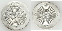 Arab-Sasanian Dynasty, lot of three (3) silver drachms. (1) Arab-Sasanian, Khusro type, silver drachm (3.97g, 31mm), bism Allah but with flower replacing rabbi in ObQ3, BYŠ (Bishapur), AH50, A‑5.  Not