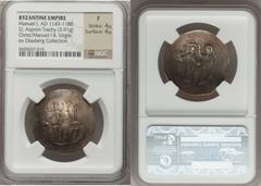BYZANTINE EMPIRE. Lot of five (5) gold and electrum coins. Includes: (1) Maurice Tiberius (AD 682-602), AV solidus, helmeted bust facing / Angel holding cross and globe. Sear 478. NGC Ch VF 3/5 - 3/5.