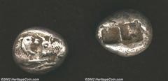 Lydia, Period of Croesos, ca, 560-546 BC, AR stater. Forepart of lion, right, confronting forepart of bull, left/ Oblong punch. SNG Von Aulock 2874, VF, nice example of this early issue.