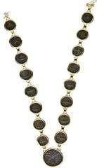 ANCIENT COIN JEWELRY. Gold necklace set with 17 Judean bronze coins. Coins consist of 16 Æ prutah of Procurator Valerius Gratus (AD 15-25) and Porcius Festus (AD 59-62), and a central medium Æ of the 