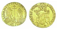 Byzantine Basil I 867-886 AD gold solidus, Christ enthroned, facing, wearing nimbus crown, pallium, and colobium, and raising right hand in benediction/Facing busts of Basil, with short beard, and Con