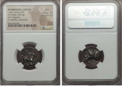 Ancients ACARNANIA. Leucas. Ca. 350 BC. AR stater (8.47 gm). NGC AU 5/5 - 4/5. Pegasus flying right, Λ below (obscured by die break) / Head of Athena left in Corinthian helmet, Λ and kerykeion behind.