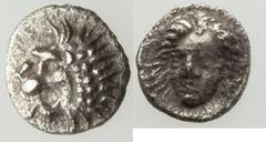 Ancients Greek CARIAN SATRAPS. Hecatomnus (395-377 BC). AR tetartemorion (0.17 gm). About XF. Mylasa. Forepart of a roaring lion left / Head of Apollo facing slightly left. SNG Finland 849. Klein 507.