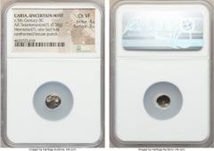 Ancients CARIA. Uncertain city. Ca. late 6th-5th centuries BC. AR hemiobol or tetartemorion (0.30 gm). NGC Choice VF 4/5 - 3/5. Confronting heads of two bulls, their horns overlapping / Rough incuse p