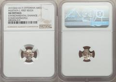 Islamic Dynasties Ottoman Empire. Mustafa I (1st Reign) Akce AH 1026 (1617) AU Details (Environmental Damage) NGC, Constantinople mint (in Turkey), KM22.3, A-1357 (RRR), Pere-388. 11mm. 0.32gm. Minorl