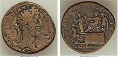 Ancients Commodus (AD 177-192). AE sestertius (31mm, 24.13 gm, 6h). Choice Fine. Rome, AD 186. M COMMODVS ANT-P FELIX AVG BRIT, laureate head of Commodus right / P M TR P XI IMP VII COS V P P, Commodu