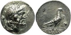 Lycia, Oinoanda. Ca. 200 B.C. AR didrachm (21 mm). Laureate head of Zeus right, lotus-tipped sceptre over shoulder; [B] behind / Eagle, wings closed, standing right on winged thunderbolt; Gamma and gr