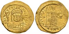 BYZANTINE COINS BYZANTINE EMPIRE. JUSTIN II, 565-578. Solidus AD 567-578, Alexandria. 10th officina. AV. 4,39 g. D N IVSTINVS P P AVG Helmeted and cuirassed bust facing, holding Victory on globe and s