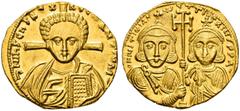 COLLECTION OF BYZANTINE COINS Justinianus II, second reign, 705-711. With his son Tiberius. Solidus. AV 4.40 g. dN IhS ChS RªX - RªGNANTIYM Facing bust of Christ with curly hairs, wearing pallium over