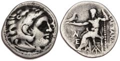 Alejandro III Magno. Dracma. 336-323 a.C. Incierta. Anv.: Cabeza de Heracles recubierta con piel de león. Rev.: Zeus entronado a izquierda con cetro y águila, delante y debajo monograma. Ar. 3,85gr. B
