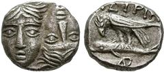 Cayetano Aníbal Collection MOESIA, Istros. diobolus (Ar. 1.14g/11mm). 4th century BC (SNG BM Black Sea 250). Obv: Male heads facing inverted. Rev: Eagle with dolphin left, Greek legend above, monogram