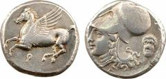 Corinthe, statère, c.345-307 av. J.-C. A/Anépigraphe. Pégase volant à gauche ; en dessous, lettre punique. R/Anépigraphe. Tête d'Athéna à gauche, coiffée du casque corinthien muni du couvre-nuque ; de