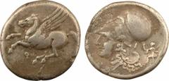 Corinthe, statère, IVe s. av. J.-C. A/Anépigraphe. Pégase volant à gauche ; en dessous, lettre punique. R/Anépigraphe. Tête d'Athéna à gauche, coiffée du casque corinthien muni du couvre-nuque ; derri