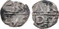 Charlemagne, denier, Arles . En deux lignes : CARo/ LVS séparées par une barre bouletée. . Croix avec les bras bouletés, accostée de A, R, D et IS. TTB, RRR Argent, 18,0 mm, 1,11 g, 3 h. D.56 (9 ex.),