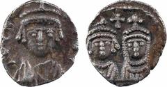 Byzantine coins Héraclius, Héraclius Constantin et Martine, demi-silique, Carthage, 610-641 A/[D N ERACLIO P P AV] Buste imberbe, couronné de face, drapé et cuirassé R/Anépigraphe Bustes couronnés et 