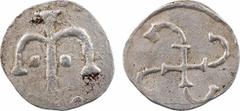 Merovingian times Neustrie, Paris, denier à la swastika, c.670-750 Le Palais Croix ancrée, accostée de deux globules Croix à branches égales, les extrémités crossées Argent 13,3 mm 1,00 g 12 h TTB / T
