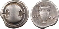 Greek coins Béotie, Thèbes, statère au nom du magistrat A??A, c.363-338 av. J.-C. A/Anépigraphe Bouclier béotien de face R/A? - ?A Amphore ; au dessus, une grappe de raisin Argent 20,8 mm 12,07 g 11 h