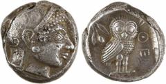 Greek coins Attique, tétradrachme de style archaïque, Athènes, c.527-510 av. J.-C A/Anépigraphe Tête d'Athéna à droite, coiffée du casque à aigrette ; elle porte des boucles d'oreilles rondes centrées