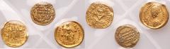 Ancient Coins 3-Piece lot of Ancient and Islamic gold coins. Include solidi of Theodosius II and Phocas, and an uncertain Islamic issue. Very Fine. Estimated Value $500 - UP