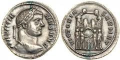 Maximianus, AD 286-305 (First Reign). AR Argenteus minted at Ticinum, c. AD 295. Laureate head right of Maximianus. Reverse: The four princes sacrificing over tripod before gate of six-turreted enclos
