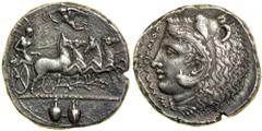 Sicily. Kamarina, ca. 425-405 BC. AR Tetradrachm (16.96g), obverse die signed by Exakestidas . Athena driving galloping quadriga right, holding kentron in her right hand, reins in her left, Nike (Vict