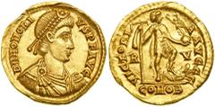 Honorius, AD 393-423. Gold Solidus (4.5 g) minted at Ravenna, AD 402-408. Pearl-diademed, draped and cuirassed bust of Honorius right. Reverse: Honorius standing right, holding labarum and Victoria (V