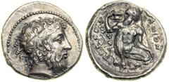 Sicily, Naxos. Silver Tetradrachm (16.81g) struck ca. 430-420 BC. Bearded head of Dionysos right wearing an ivy-wreathed stephanos, his short hair hanging loose in curly locks. Reverse: Nude and beard