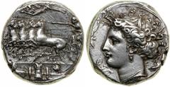 Sicily, Syracuse. Dionysios I. Silver Decadrachm (43.2 g), 405-367 BC. Unsigned dies by Euainetos. Struck ca. 405-400 BC. Charioteer driving galloping quadriga left, holding kentron and reins; above, 