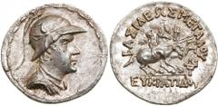 Baktrian Kingdom. Eukratides I. Silver Tetradrachm (16.9 g), ca. 171-145 BC. Helmeted, diademed and draped bust of Eukratides I right. Reverse , the Dioskouroi riding on horses rearing right, holding 