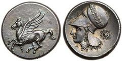 Corinthia, Corinth. Silver Stater (8.55 g), ca. 375-300 BC. Koppa below, Pegasus flying left. Reverse: Helmeted head of Athena left, bowl of helmet adorned with wreath; behind, aegis; below neck, A-P.