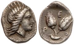 Islands off Caria, Rhodes. Silver Diobol (1.12 g), ca. 334-304 BC. Radiate head of Helios right. Reverse: P-O, two rose buds arising from a leaf cup; above E. Ashton 91.73; NG Keckman 430ff. Rare. Ton