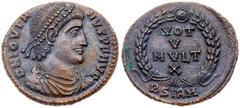 Jovian. Æ (3.61 g), AD 363-364. Sirmium. D N IOVIA-NVS P F AVG, diademed, draped and cuirassed bust of Jovian right. Reverse: VOT/V/MVLT/X in four lines within wreath with large central jewel; BSIRM. 