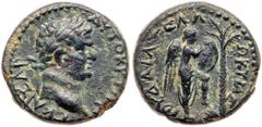 Ancient Coins Judaea, Roman Judaea. Titus. Æ (6.62 g), as Caesar, AD 69-79. Judaea Capta type. Caearea Maritima. AYTOKP TITO-Σ KAIΣAP, laureate head of Titus right. Reverse: IO-YΔAIA[Σ] EAΛ-ΩKYIAΣ, Ni