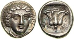 Caria, Islands off of. Rhodes, c. 404-385 BC. AR Tetradrachm (15.22 g). Facing head of Helios, inclined slightly to the right Reverse: Rose in profile with bud to left, wreath below right, Ph above; e
