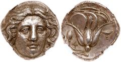 Ancient Coins Islands off Caria, Rhodes. Silver Tetradrachm (14.98 g), ca. 404-385 BC. Head of Helios facing slightly right. Reverse: POΔION, Rose in profile, bud to left; to left, Φ; to right, kylix;